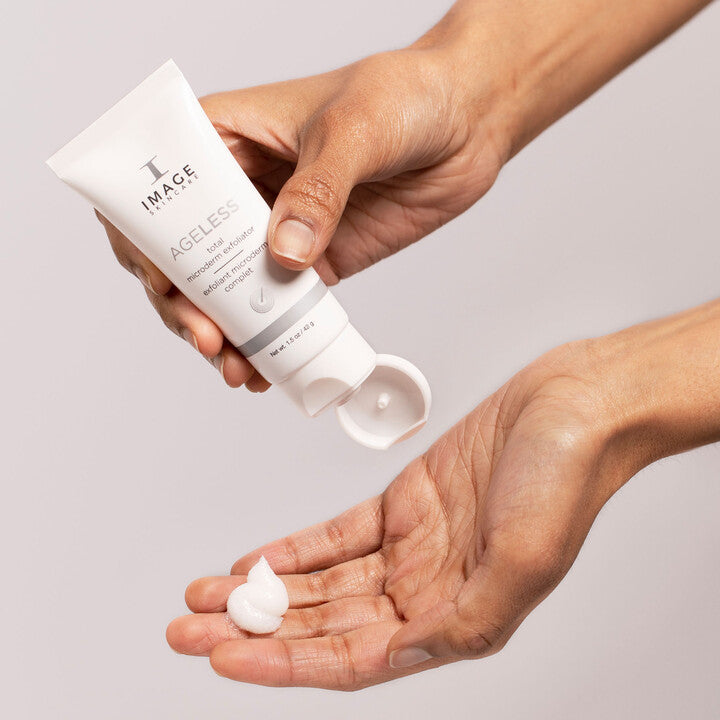 Model using AGELESS Total Microderm Exfoliator
