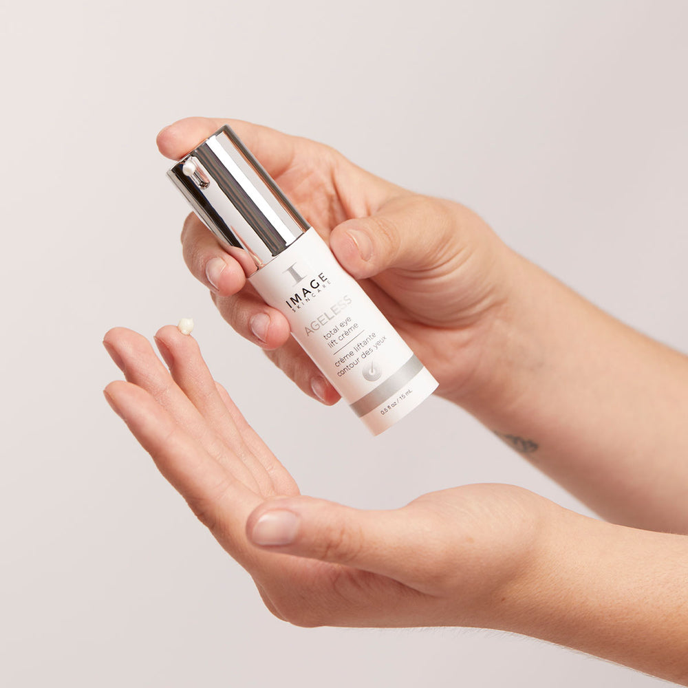 Model using AGELESS Total Eye Lift Crème