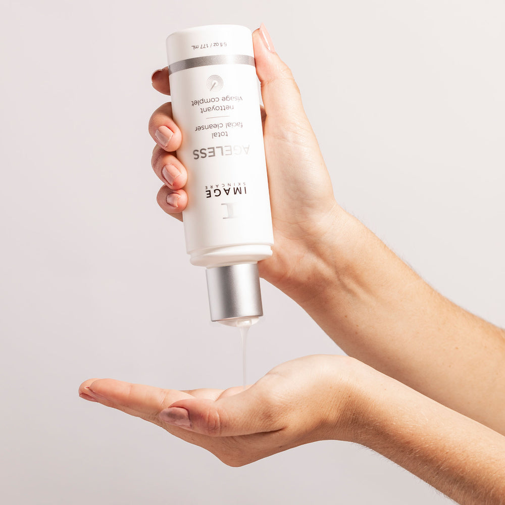 Model using AGELESS Total Facial Cleanser