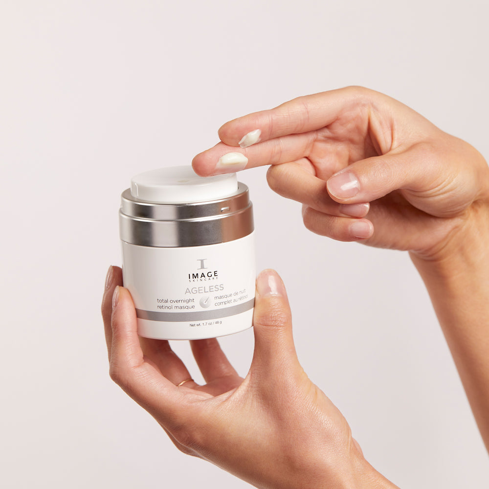 Model using AGELESS Total Overnight Retinol Masque