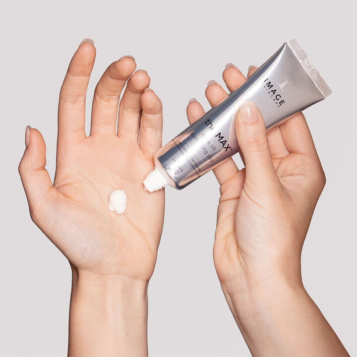 Model squeezing The MAX Neck Lift onto hand