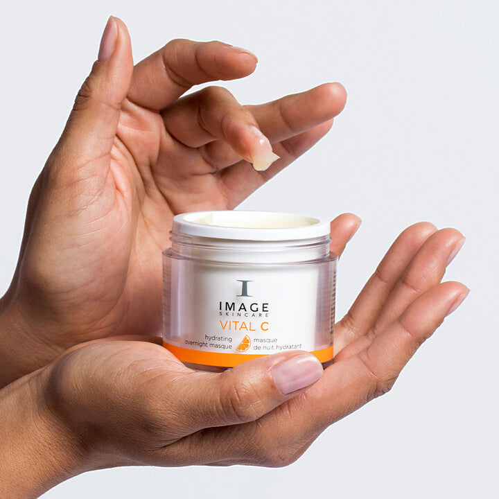 Model using VITAL C Hydrating Overnight Masque
